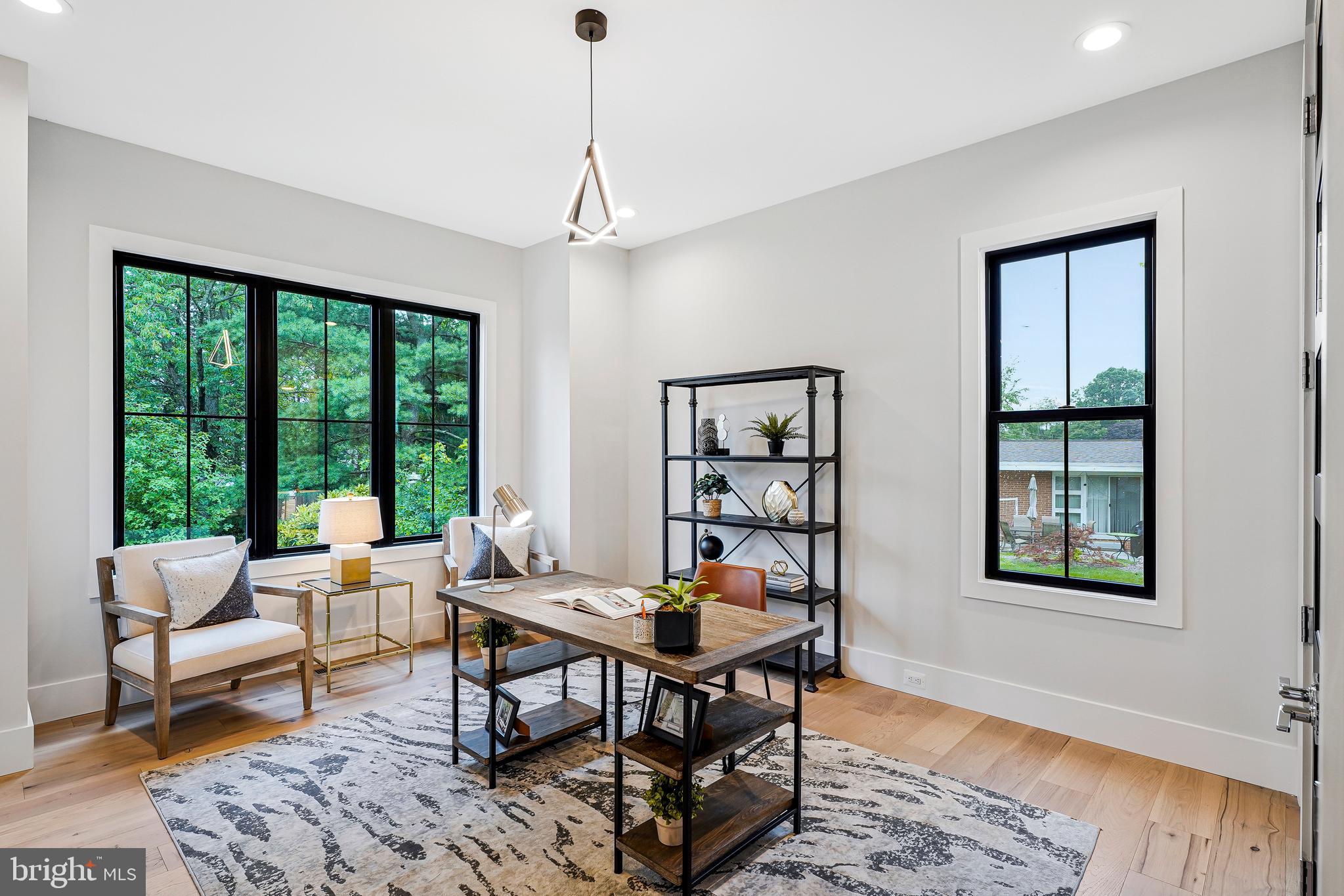 11410 Waples Mill Road Oakton, VA 22124 - Photo 67 of 104 a living room with furniture and a window