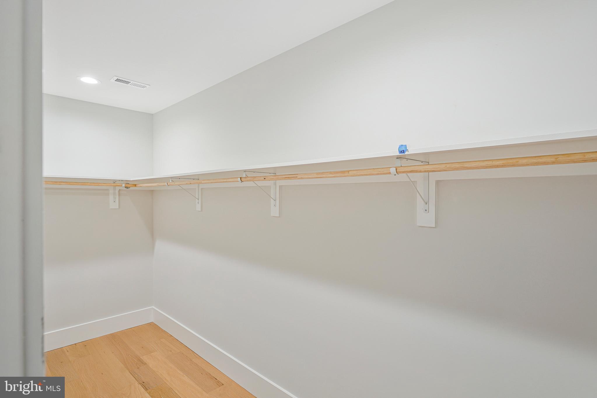 11410 Waples Mill Road Oakton, VA 22124 - Photo 90 of 104 a view of a room with racks on the wall