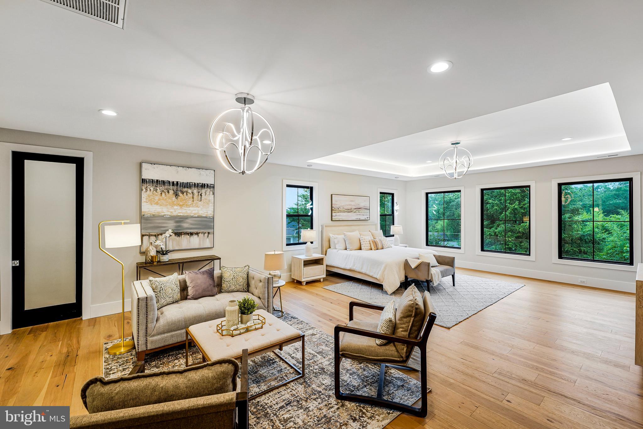 11410 Waples Mill Road Oakton, VA 22124 - Photo 9 of 104 a living room with furniture a rug and a large window