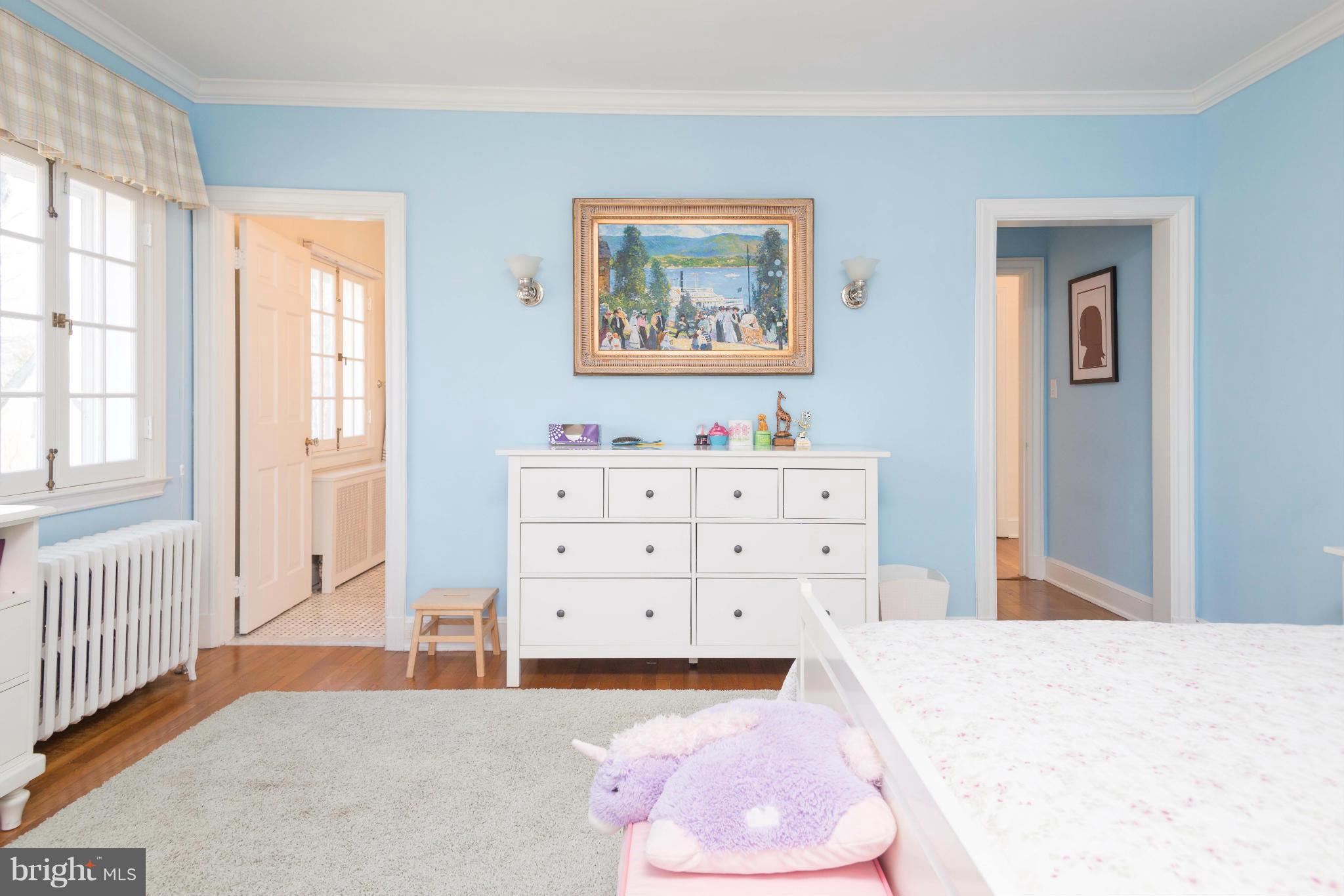 207 Witherspoon Road Baltimore, MD 21212 - Photo 23 of 28 a bedroom with a bed and a dresser