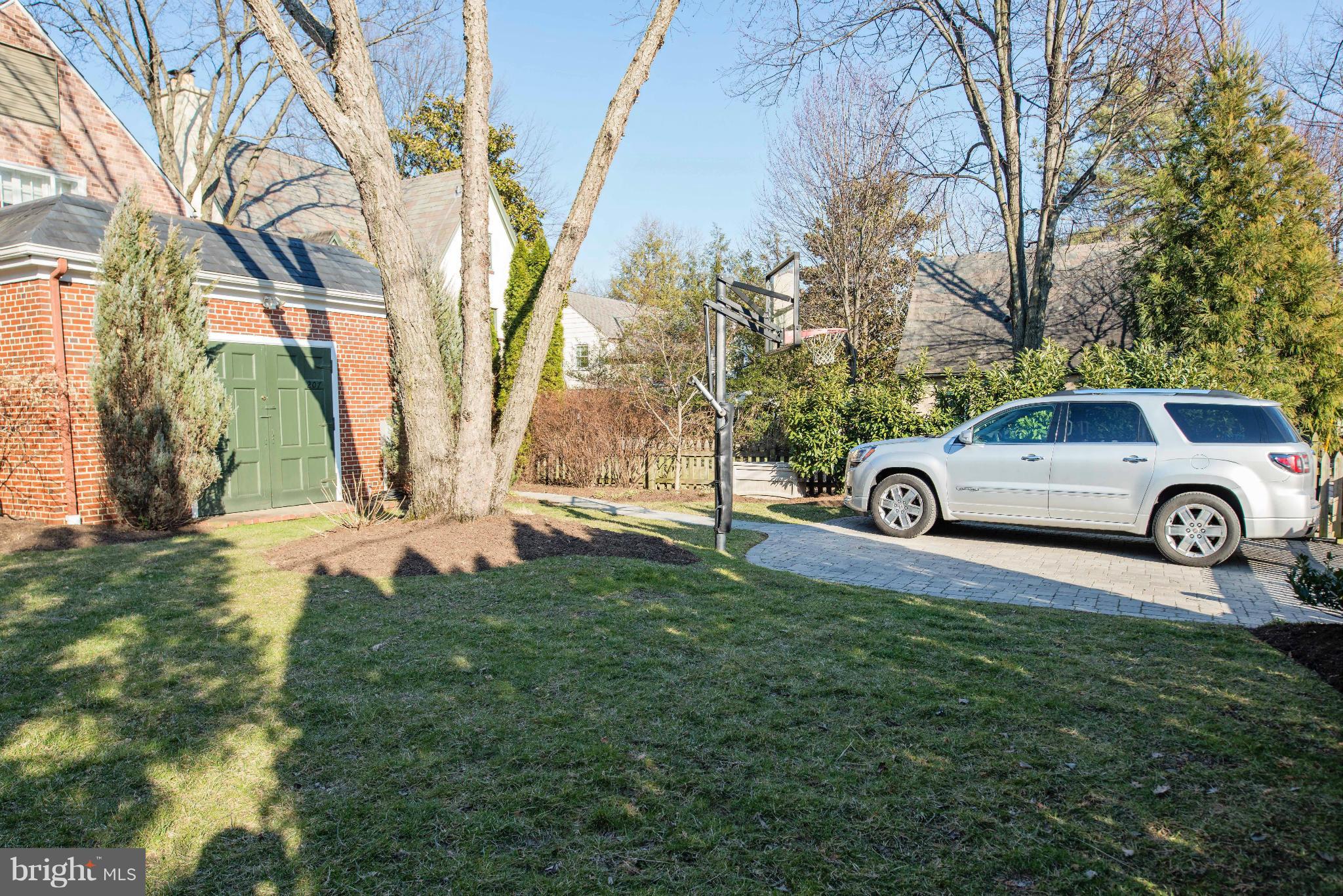 207 Witherspoon Road Baltimore, MD 21212 - Photo 28 of 28 a car parked in front of a house