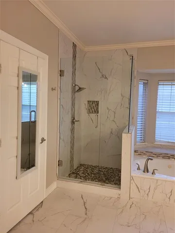 a white toilet sitting next to a window