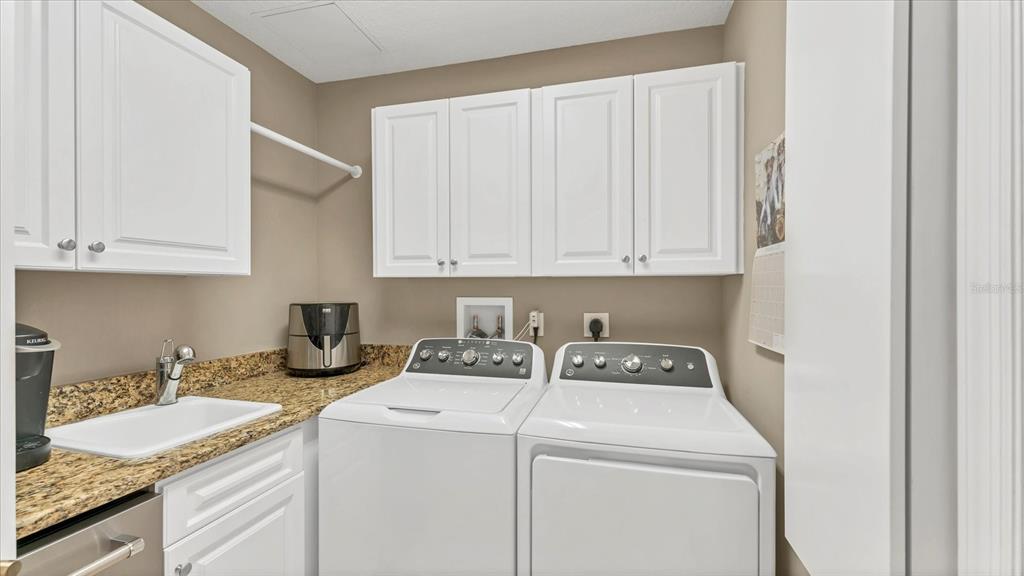 6414 Water Crest Way, Unit 302 Lakewood Ranch, FL 34202 - Photo 42 of 74 a view of washer and dryer