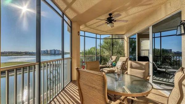 a view of a dining room with furniture and window