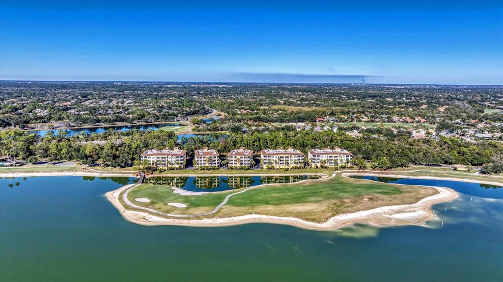6414 Water Crest Way, Unit 302 Lakewood Ranch, FL 34202 - Photo 54 of 74 a view of a city with lots of residential buildings