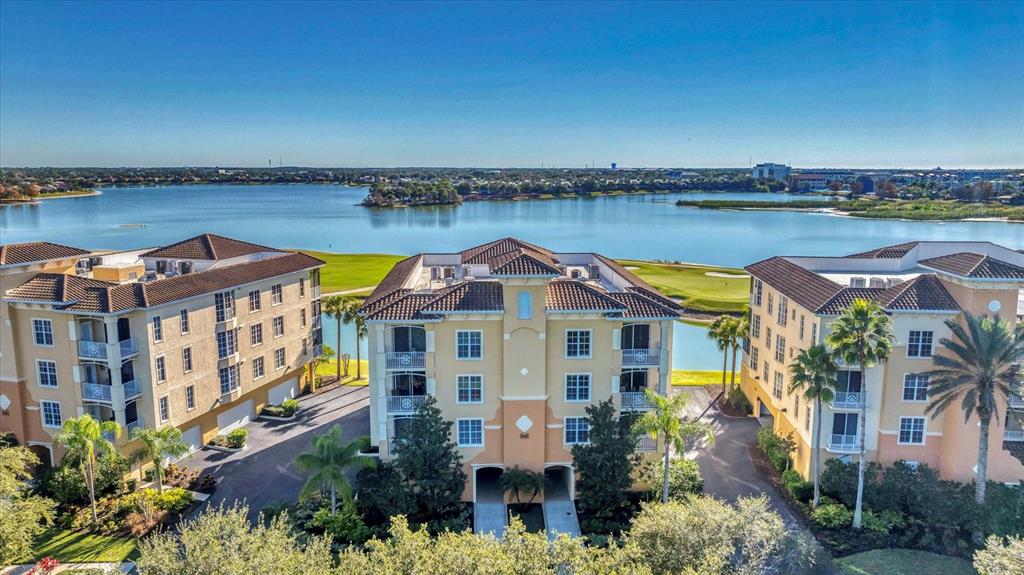 6414 Water Crest Way, Unit 302 Lakewood Ranch, FL 34202 - Photo 6 of 74 an aerial view of a house with a lake view