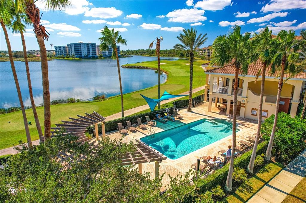 6414 Water Crest Way, Unit 302 Lakewood Ranch, FL 34202 - Photo 73 of 74 a view of a swimming pool with a garden
