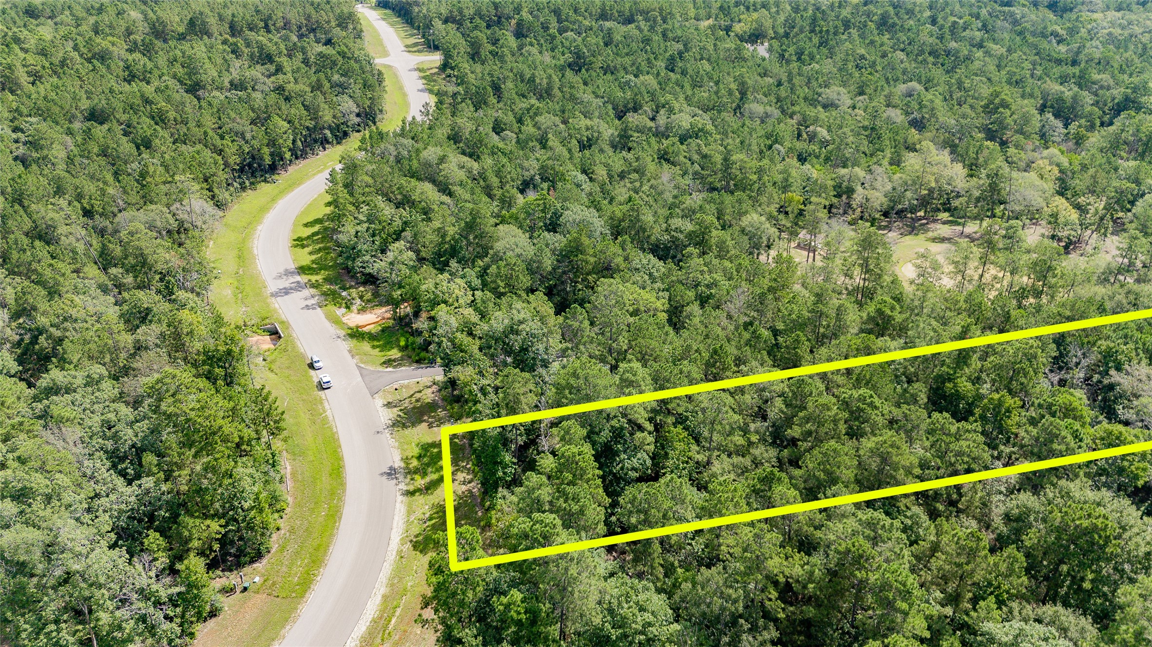194 Exploration Road Willis, TX 77378 - Photo 16 of 17 a view of a forest from a balcony