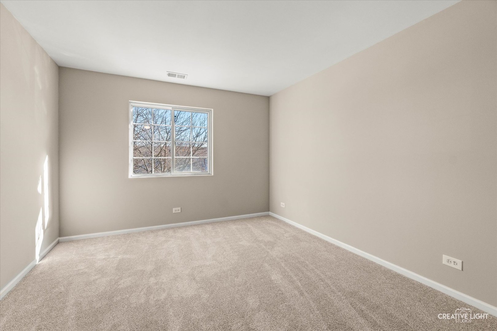 862 North 1st Street, Unit 862 Elburn, IL 60119 - Photo 11 of 32 an empty room with windows