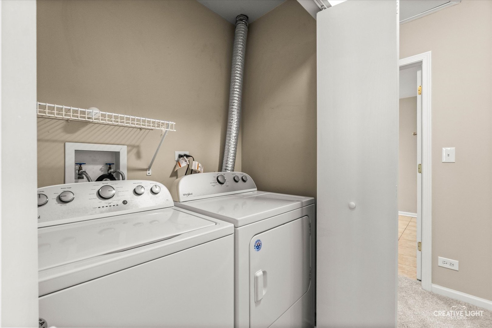 862 North 1st Street, Unit 862 Elburn, IL 60119 - Photo 10 of 32 a utility room with dryer and washer