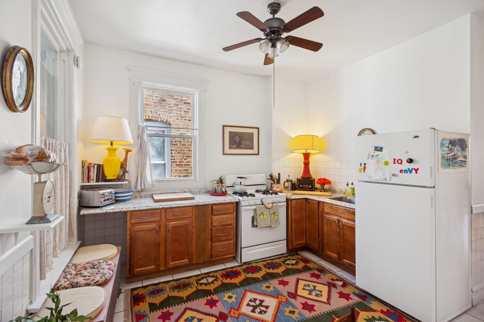 3226 West Thomas Street Chicago, IL 60651 - Photo 15 of 28 a kitchen with a sink appliances and cabinets