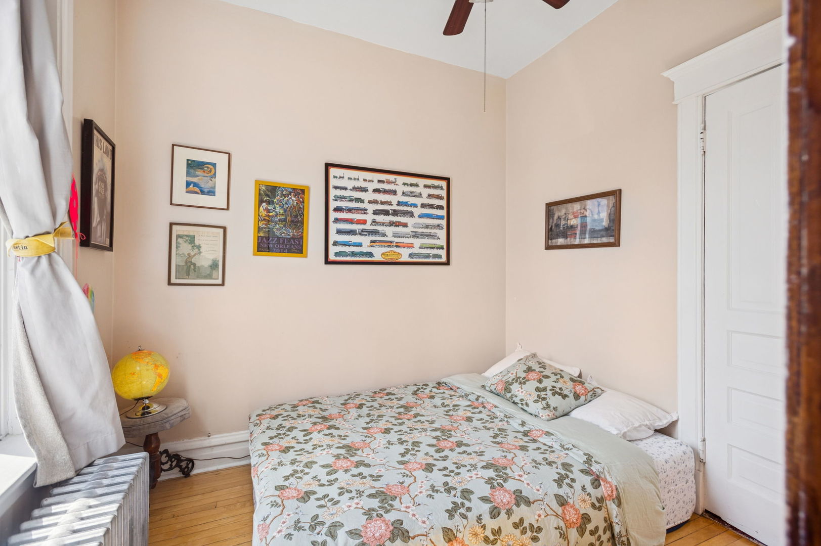 3226 West Thomas Street Chicago, IL 60651 - Photo 18 of 28 a bedroom with a bed and wooden floor
