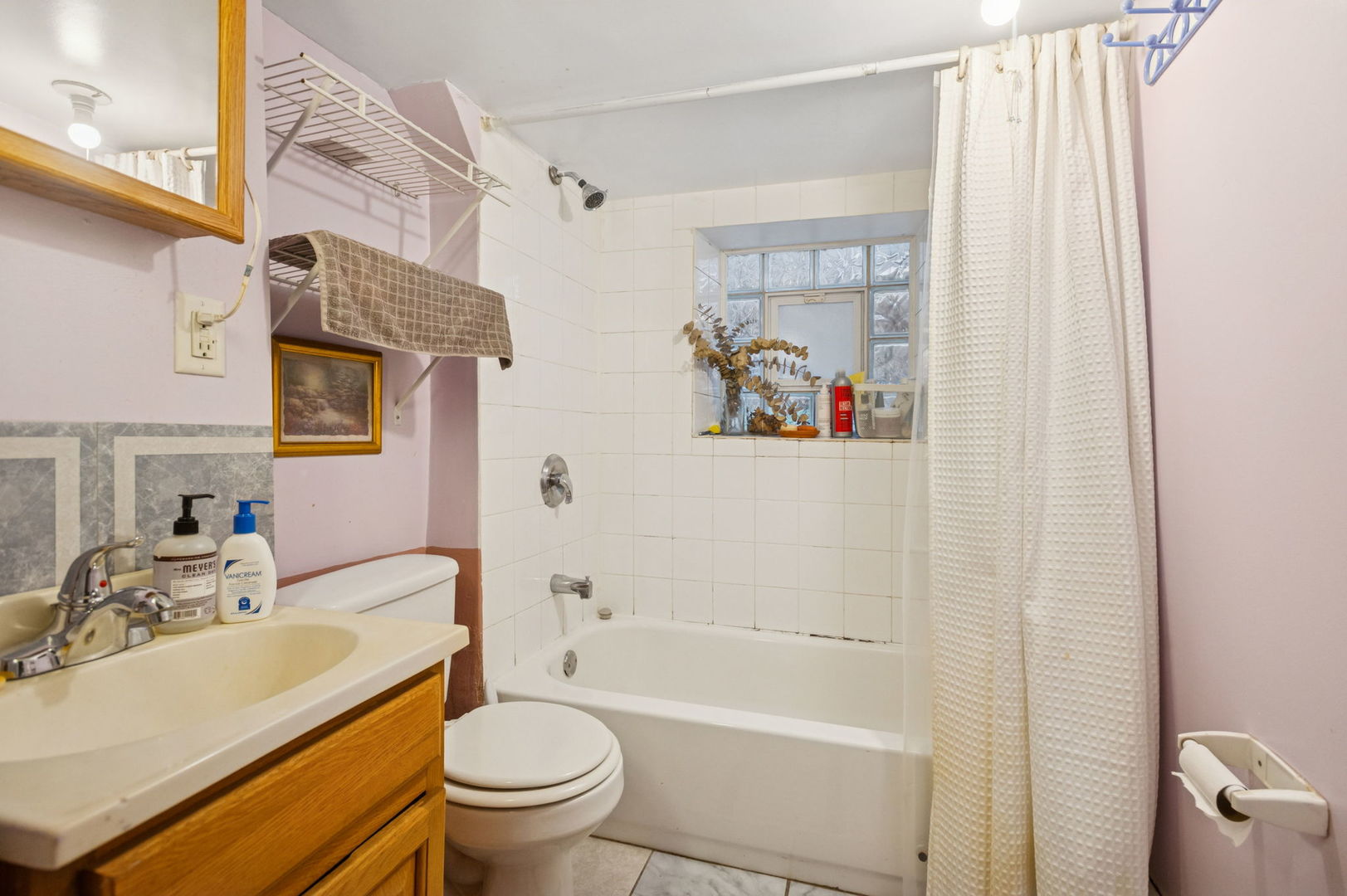 3226 West Thomas Street Chicago, IL 60651 - Photo 23 of 28 a bathroom with a sink toilet and shower