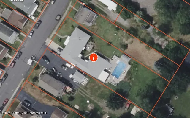 a bedroom with furniture and a flat screen tv