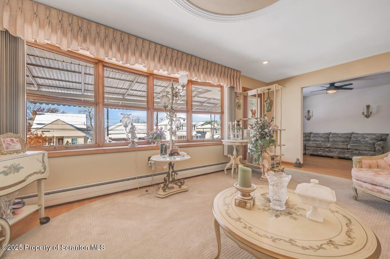 216 Prospect Street Dunmore, PA 18512 - Photo 5 of 81 a living room with furniture and a large window