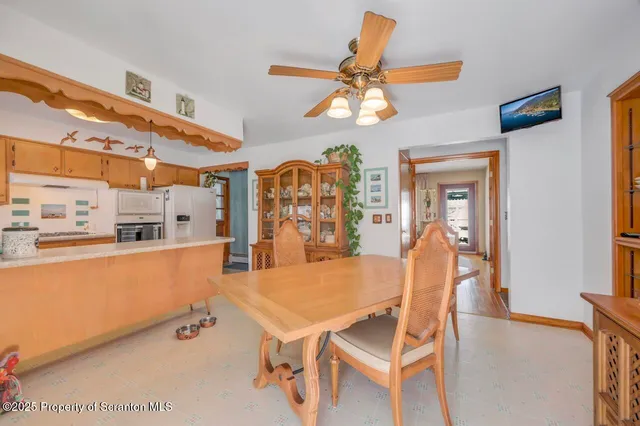 a bathroom with a bathtub a shower and a sink