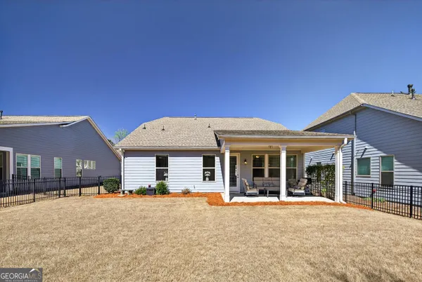 a view of a house with a ocean view