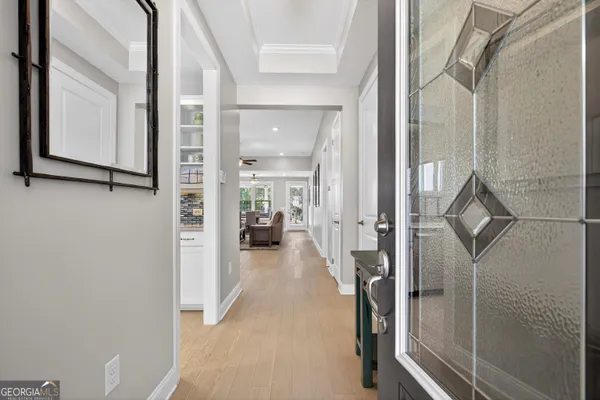 a kitchen with a sink a counter and cabinets