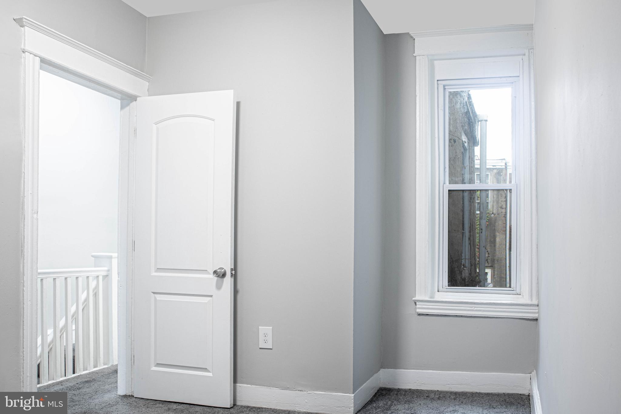 2348 Moore Street Philadelphia, PA 19145 - Photo 16 of 27 an entryway with wooden floor and cabinet