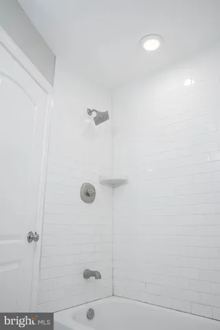 a bathroom with a bathtub