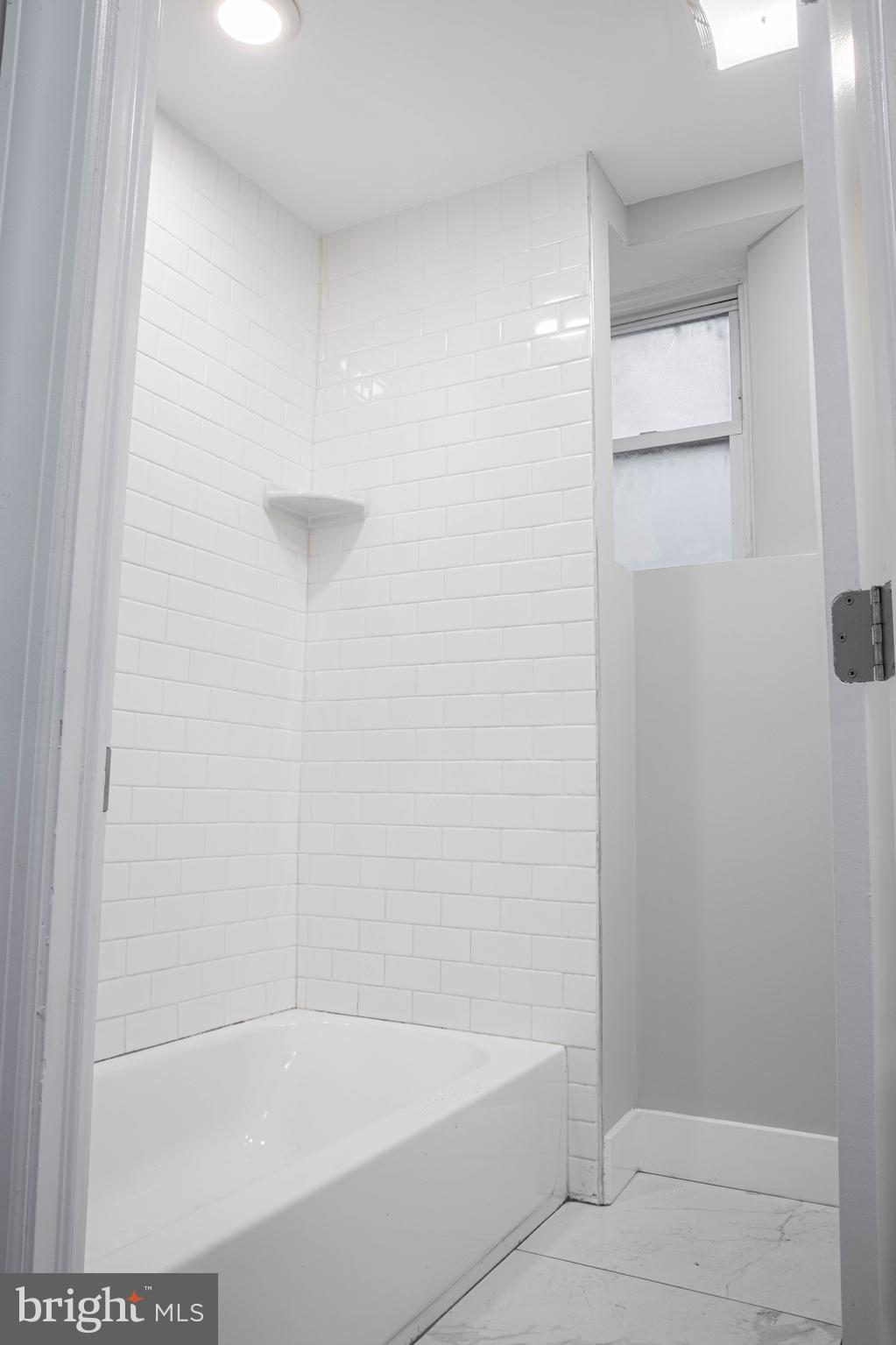 2348 Moore Street Philadelphia, PA 19145 - Photo 18 of 27 a bathroom with a bathtub