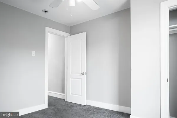 a view of a room that has a window in it