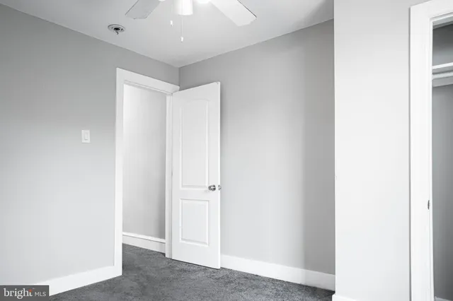 a view of a room that has a window in it