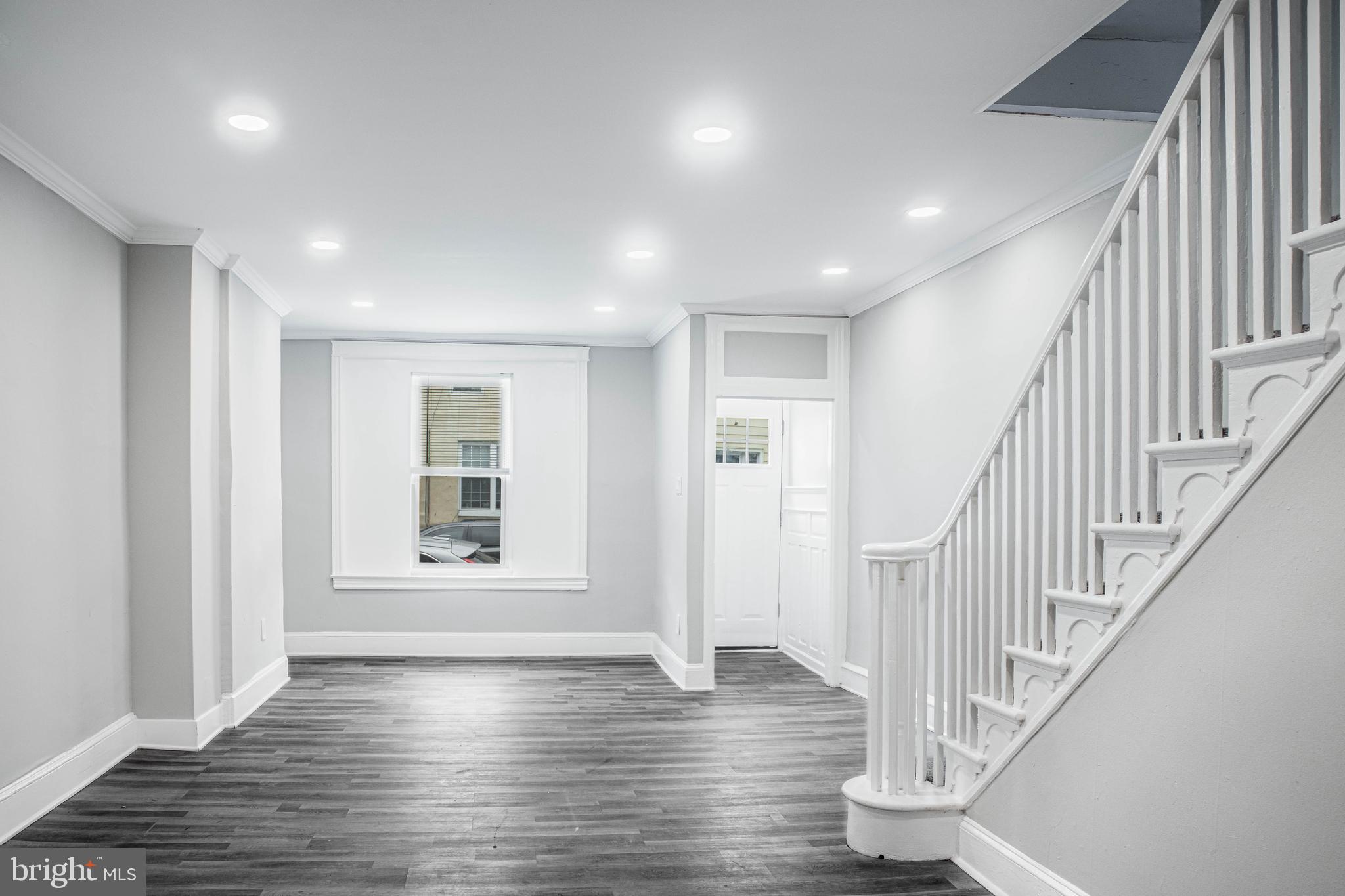 2348 Moore Street Philadelphia, PA 19145 - Photo 27 of 27 a view of an entryway with wooden floor