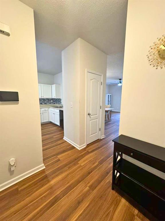 1748 Broad River Road Atlanta, GA 30349 - Photo 4 of 20 a room with wooden floor and furniture