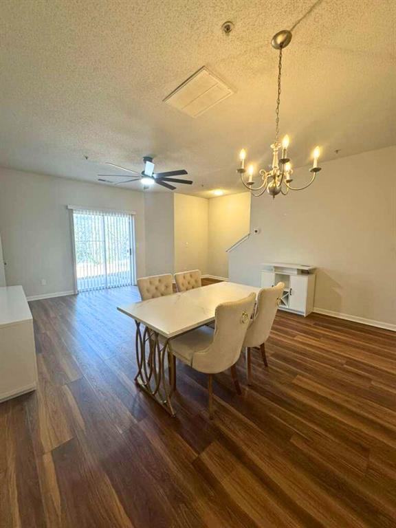 1748 Broad River Road Atlanta, GA 30349 - Photo 7 of 20 a view of a dining room with furniture and wooden floor