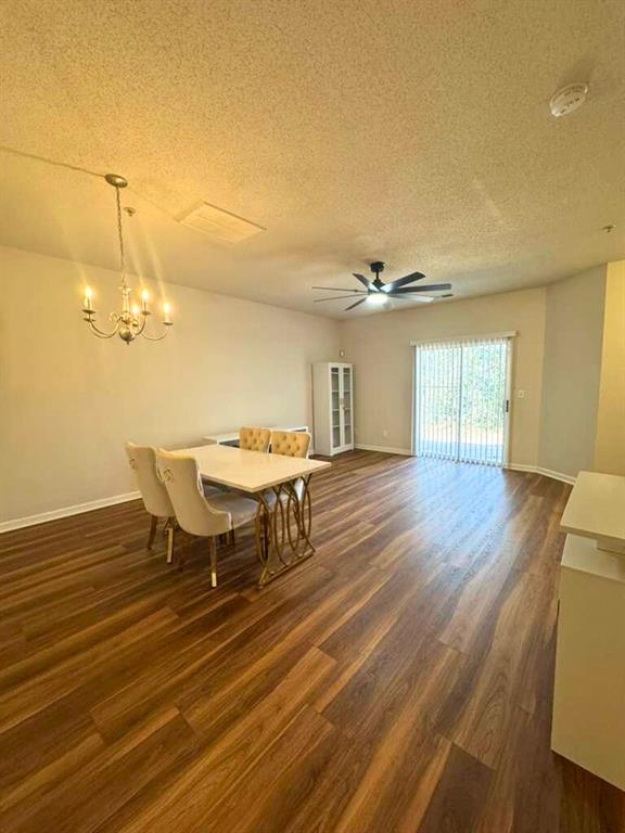 1748 Broad River Road Atlanta, GA 30349 - Photo 8 of 20 a view of a dining room with furniture and wooden floor