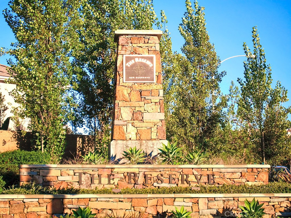 1609 Vista Luna San Clemente, CA 92673 - Photo 25 of 33 a street sign on a wall next to a road