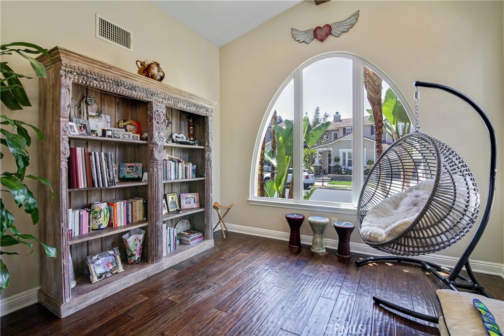 1609 Vista Luna San Clemente, CA 92673 - Photo 3 of 33 a living room with furniture and a book shelf