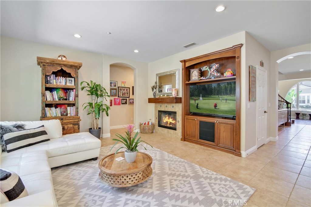 1609 Vista Luna San Clemente, CA 92673 - Photo 9 of 33 a living room with furniture and a flat screen tv
