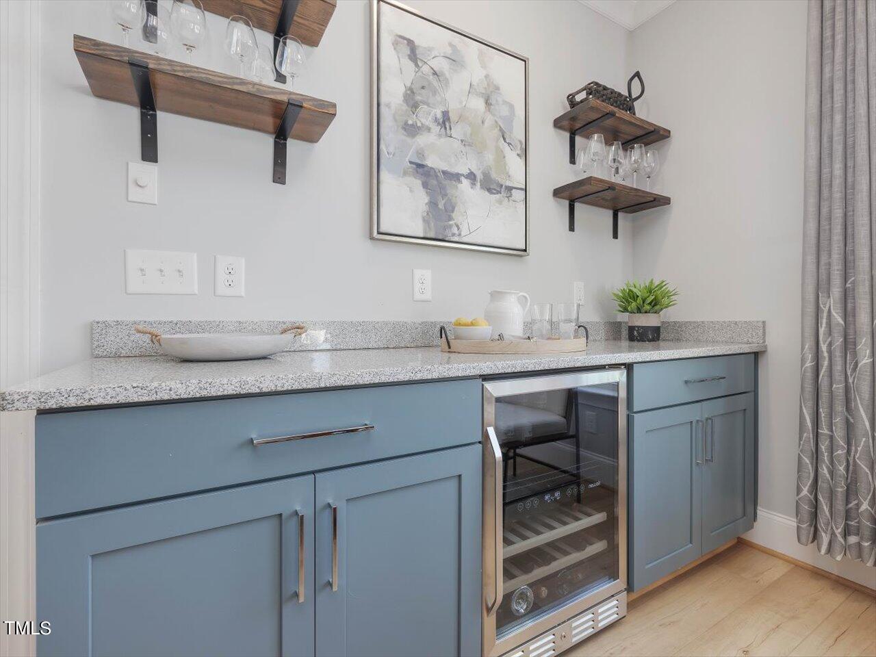 9117 Penny Road Raleigh, NC 27606 - Photo 11 of 72 a bathroom with a sink and a mirror