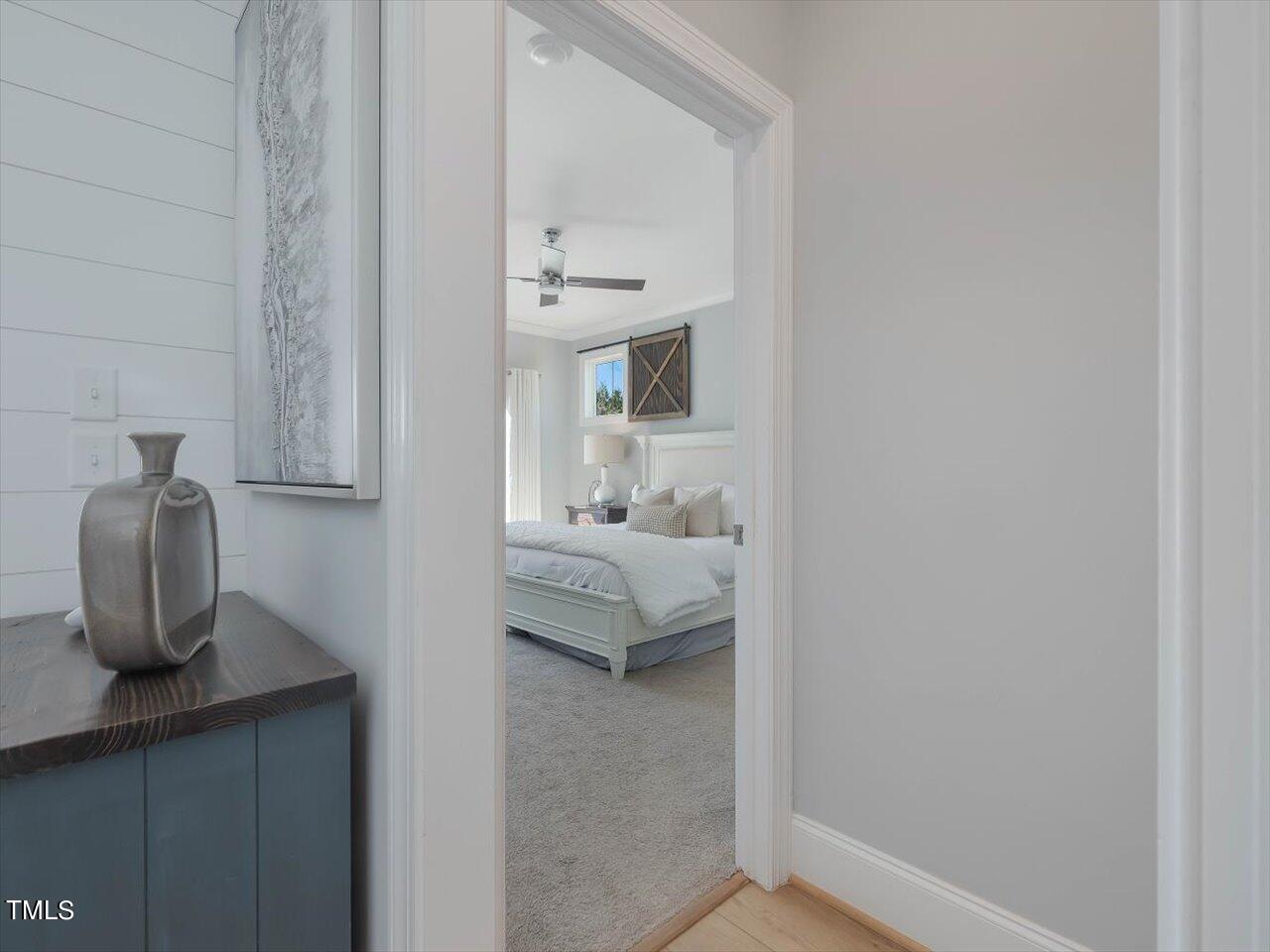 9117 Penny Road Raleigh, NC 27606 - Photo 19 of 72 a bathroom with a sink and vanity