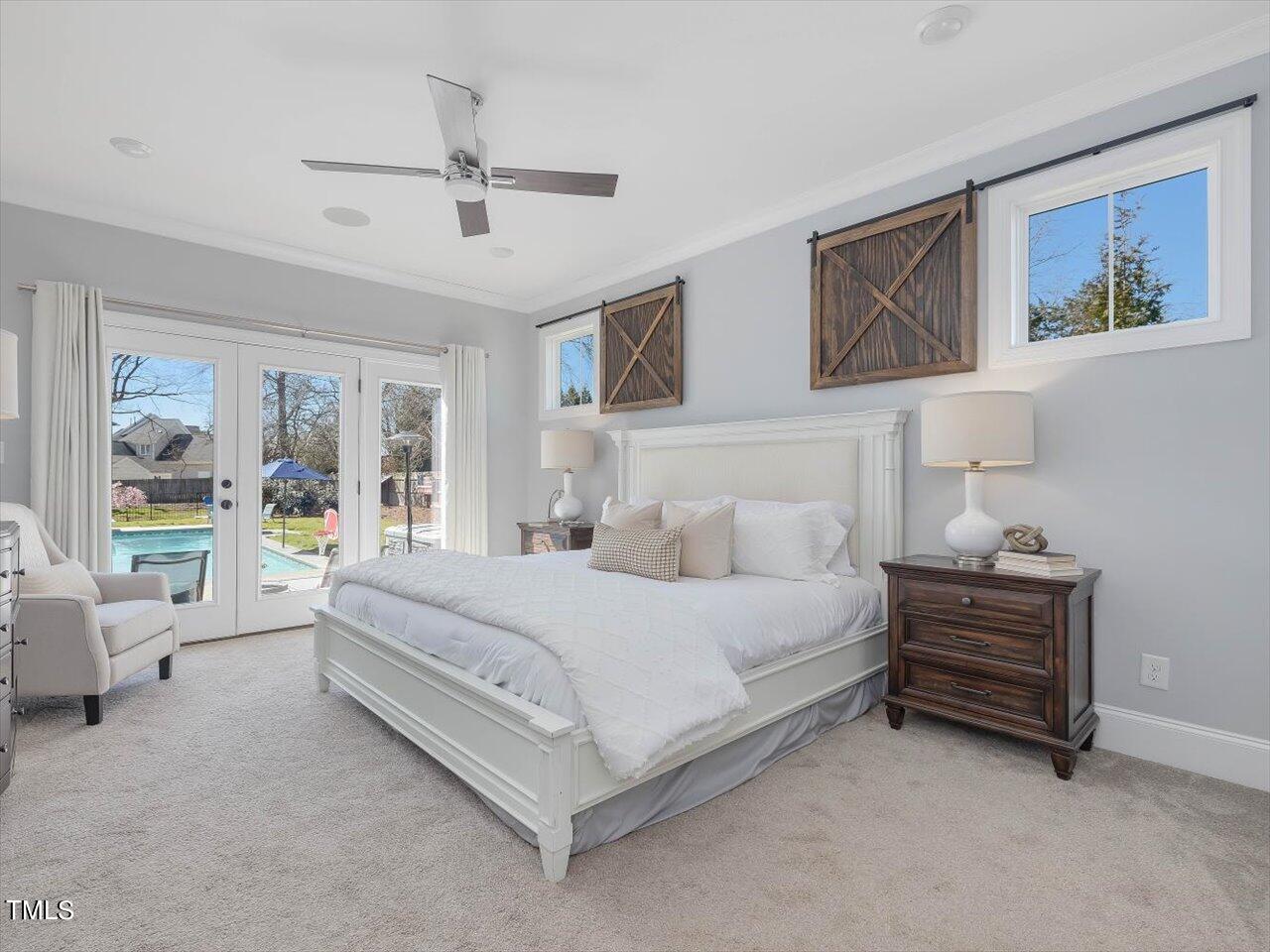 9117 Penny Road Raleigh, NC 27606 - Photo 20 of 72 a bedroom with a bed and a couch