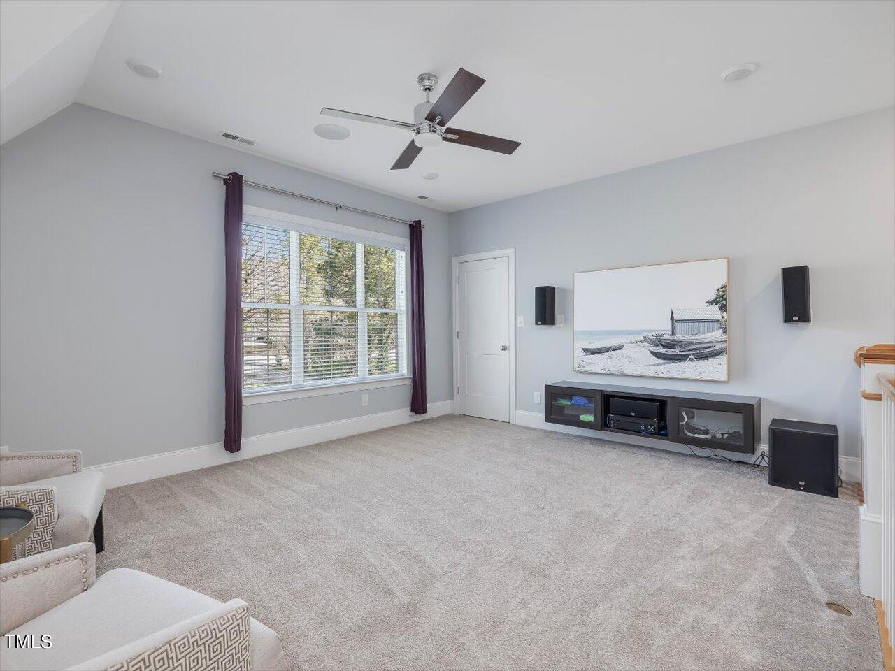 9117 Penny Road Raleigh, NC 27606 - Photo 30 of 72 a view of livingroom with furniture and window