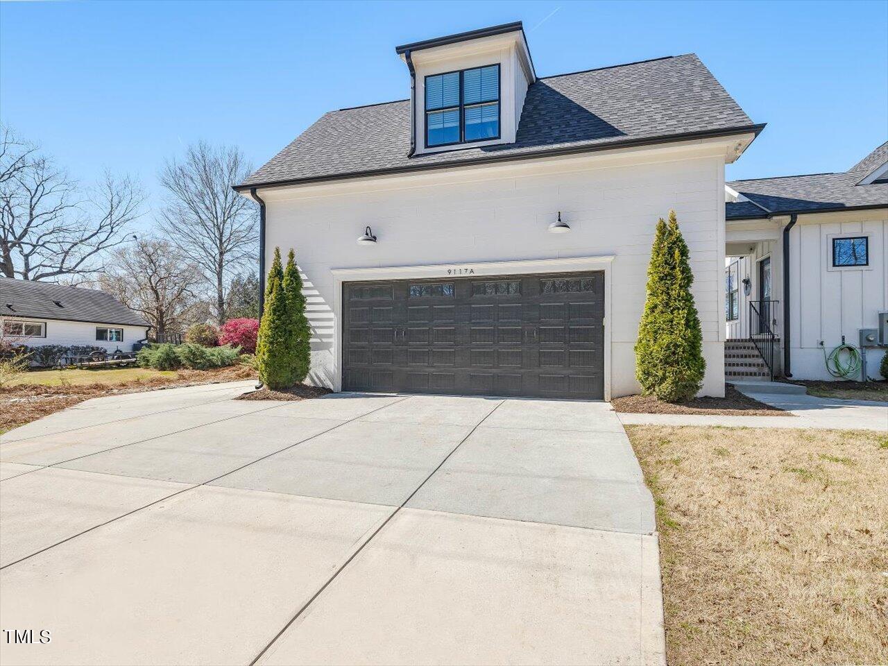 9117 Penny Road Raleigh, NC 27606 - Photo 48 of 72 a front view of a house
