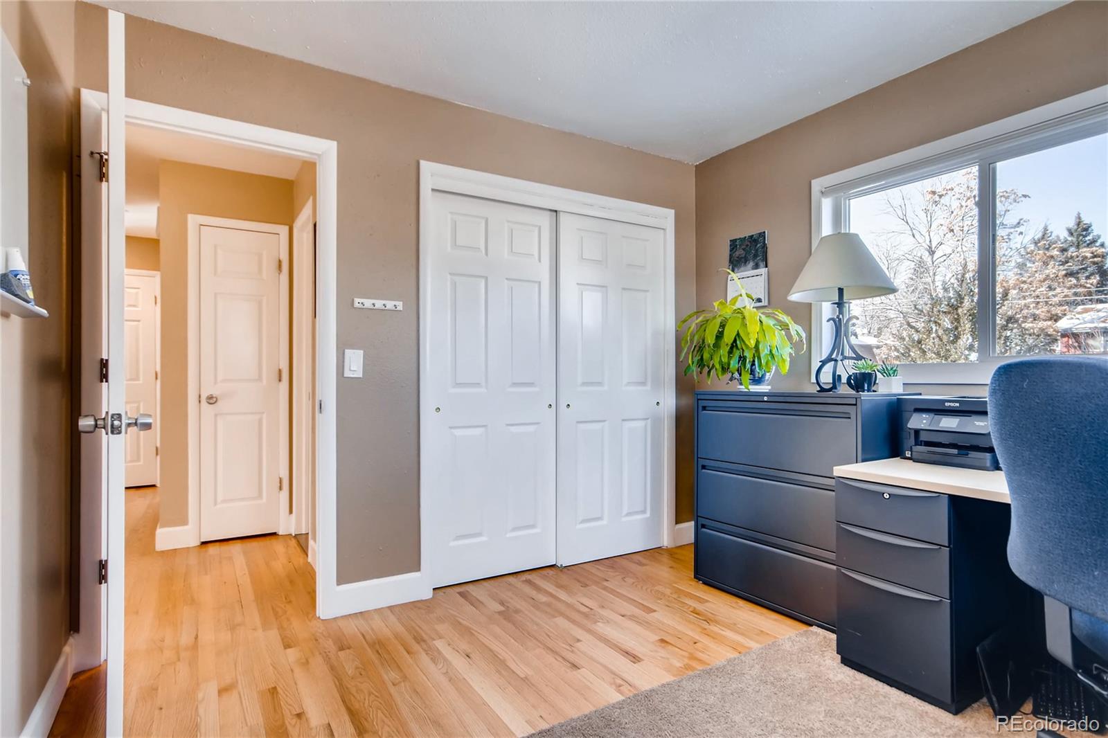 3315 West Pimlico Avenue Englewood, CO 80110 - Photo 12 of 35 a bedroom with a bed and a window