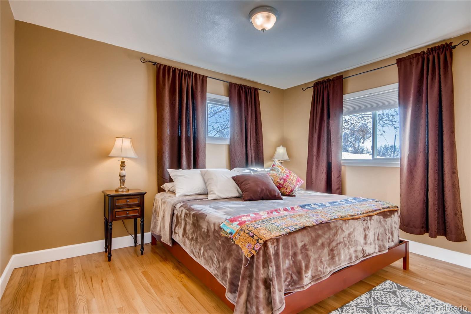 3315 West Pimlico Avenue Englewood, CO 80110 - Photo 15 of 35 a bedroom with a bed and a window