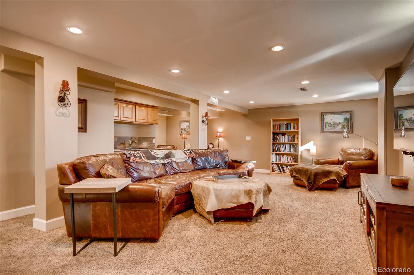 3315 West Pimlico Avenue Englewood, CO 80110 - Photo 19 of 35 a bedroom with furniture and a couch