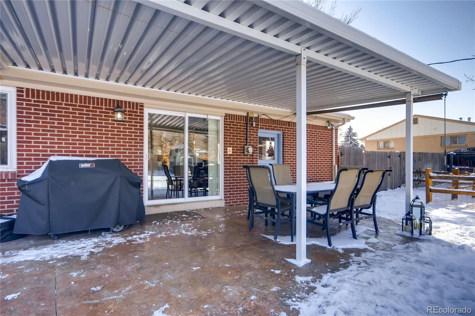 3315 West Pimlico Avenue Englewood, CO 80110 - Photo 28 of 35 a view of a patio with a table and chairs