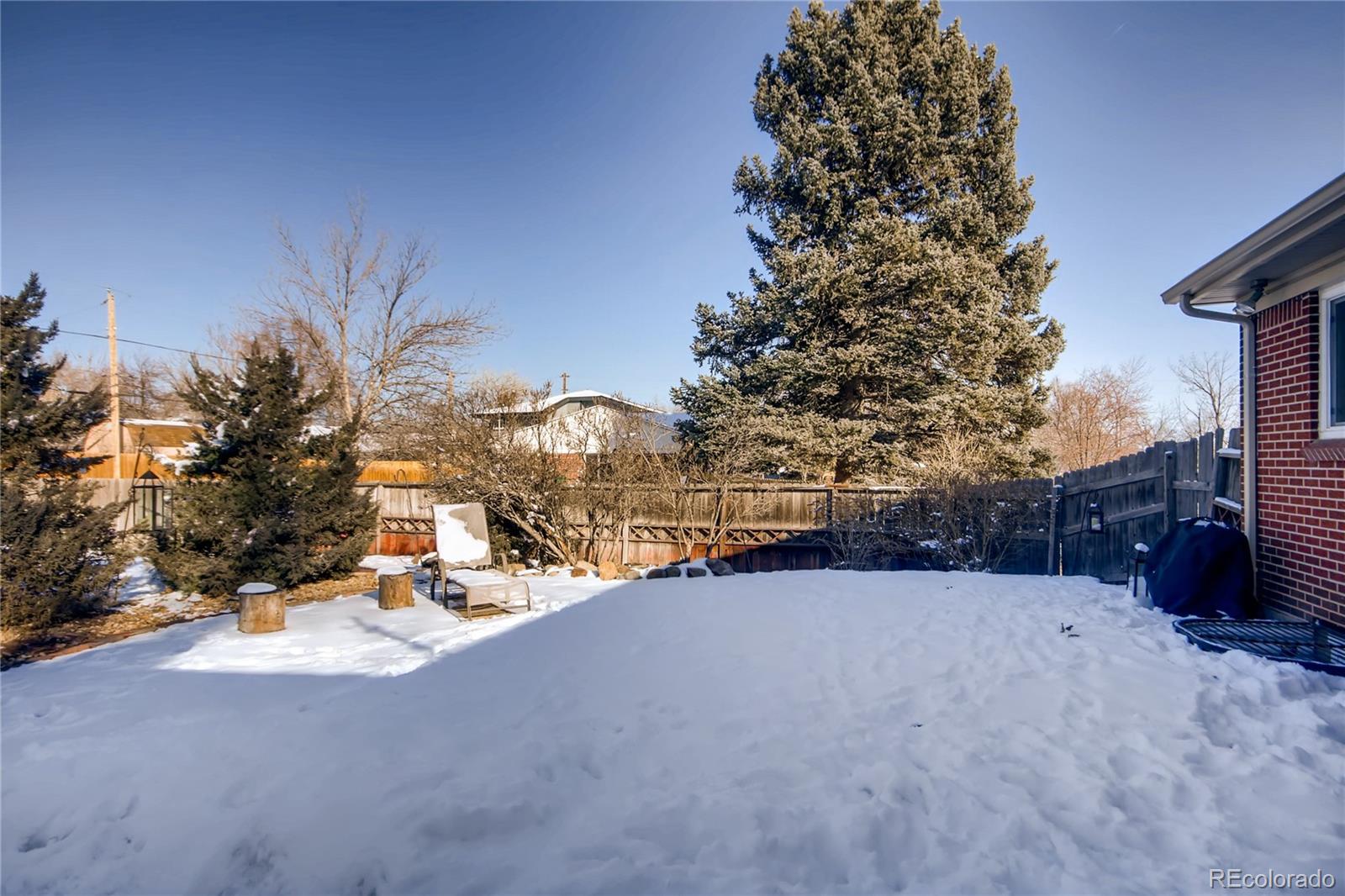 3315 West Pimlico Avenue Englewood, CO 80110 - Photo 29 of 35 a view of swimming pool with a yard