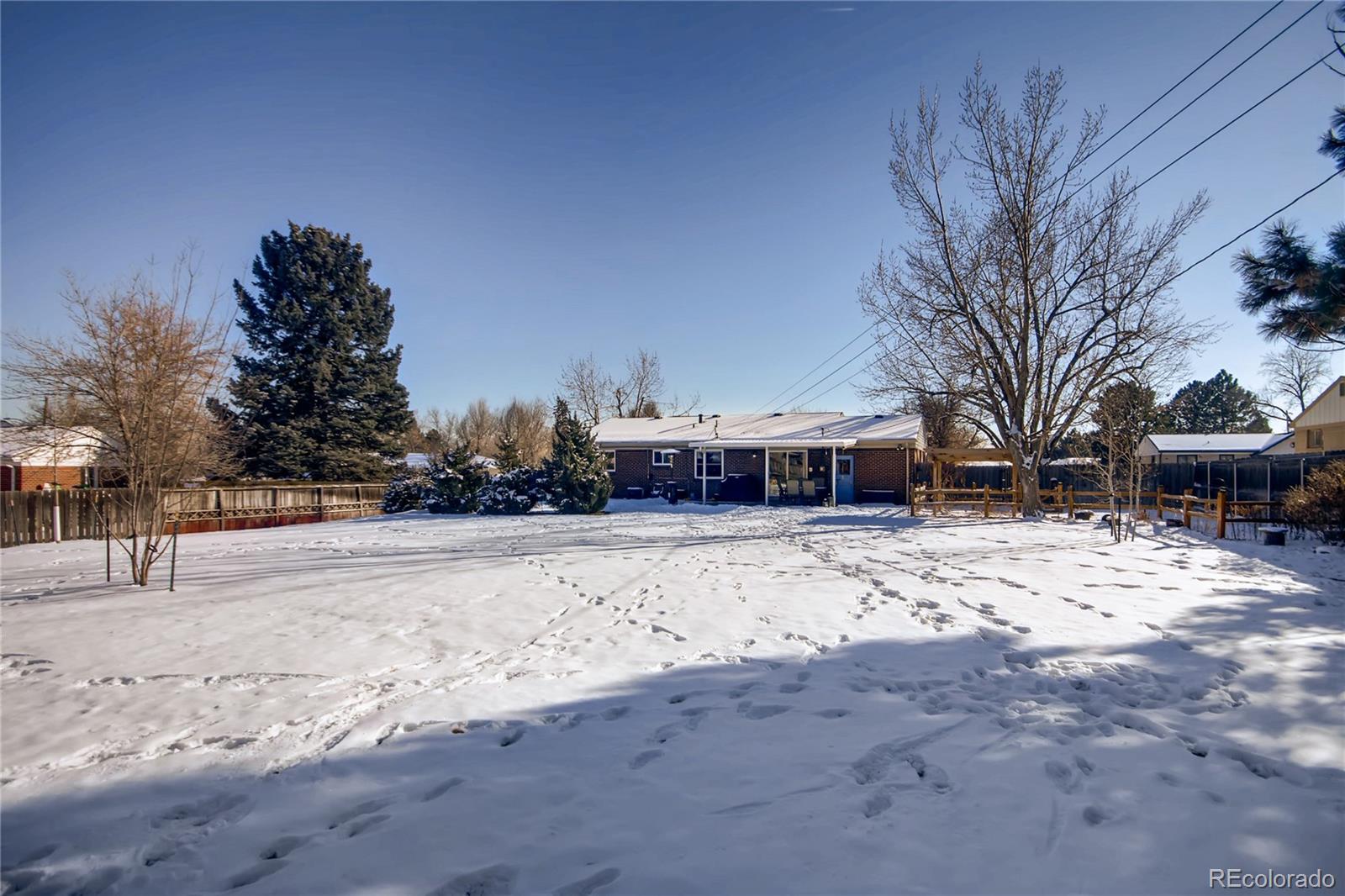 3315 West Pimlico Avenue Englewood, CO 80110 - Photo 32 of 35 a view of a snow with a yard