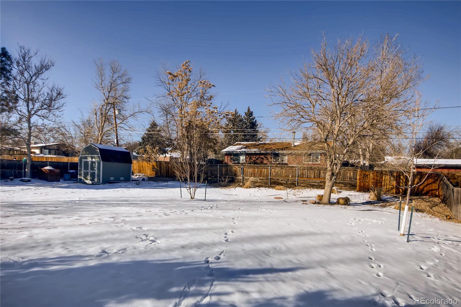 3315 West Pimlico Avenue Englewood, CO 80110 - Photo 33 of 35 a view of road with card parked on the roadside