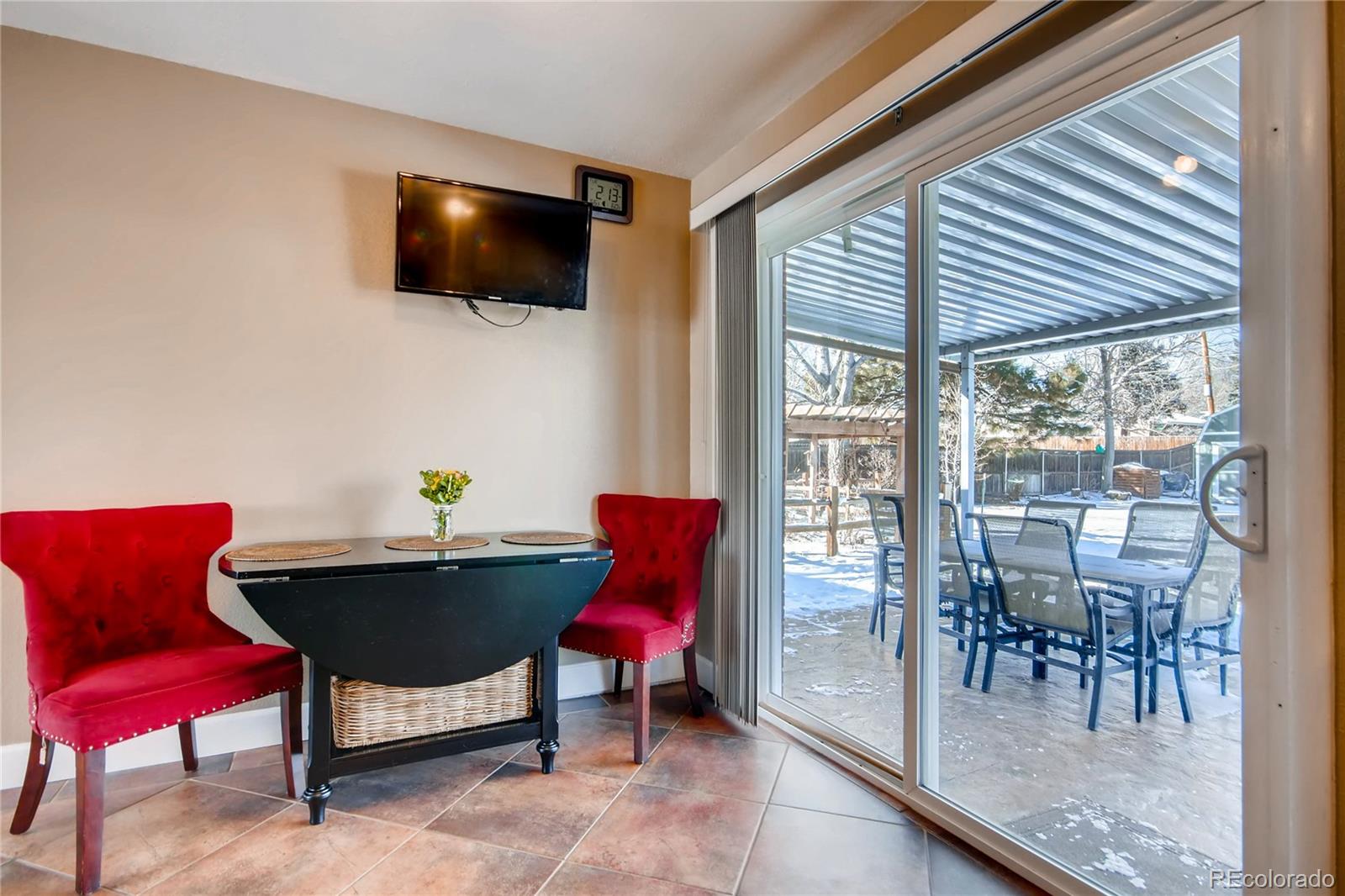 3315 West Pimlico Avenue Englewood, CO 80110 - Photo 10 of 35 a living room with furniture and a flat screen tv