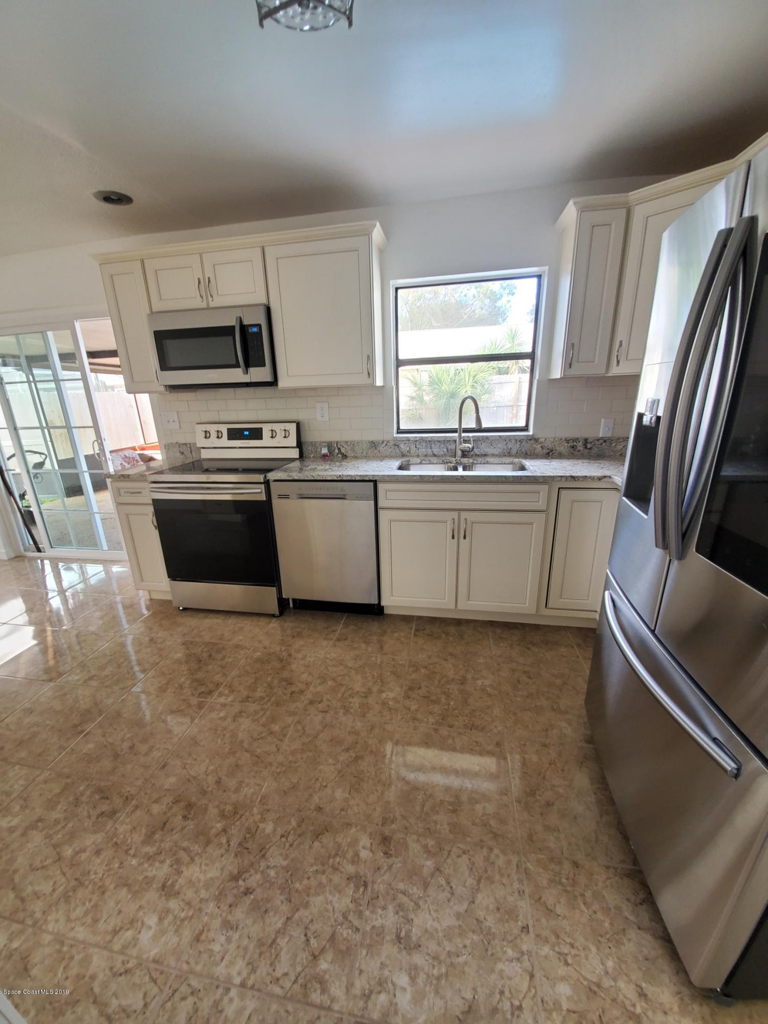 890 Kings Post Road Rockledge, FL 32955 - Photo 5 of 14 Kitchen