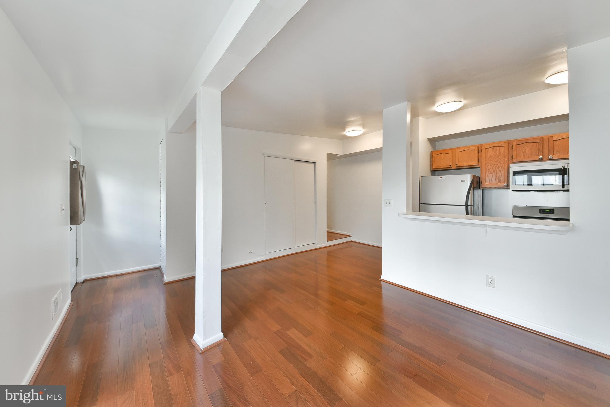 357 Lyceum Avenue Philadelphia, PA 19128 - Photo 11 of 21 a view of a kitchen with wooden floor and electronic appliances