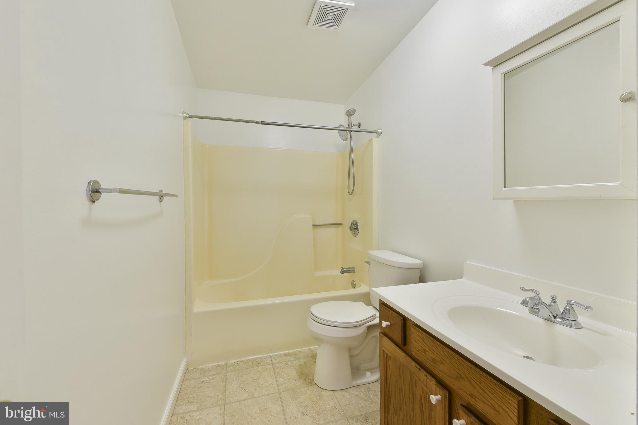 357 Lyceum Avenue Philadelphia, PA 19128 - Photo 20 of 21 a bathroom with a sink a toilet and shower
